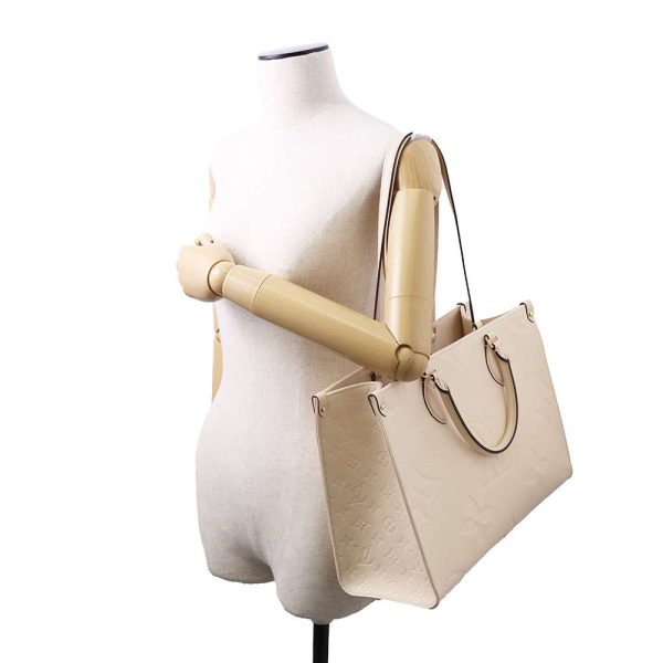 m46531 05 Louis Vuitton On the Go MM Tote Bag Creme