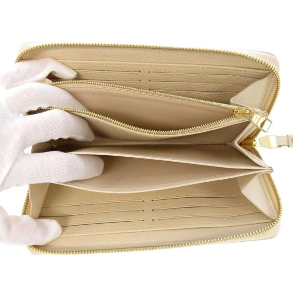 m81914 04 Louis Vuitton Round Zipper Long Wallet Cream