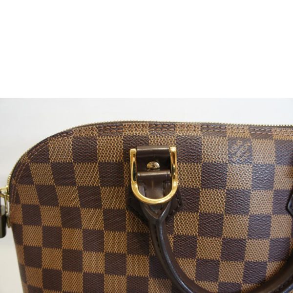 06506 11 Louis Vuitton Alma PM Damier Ebene Bag Brown