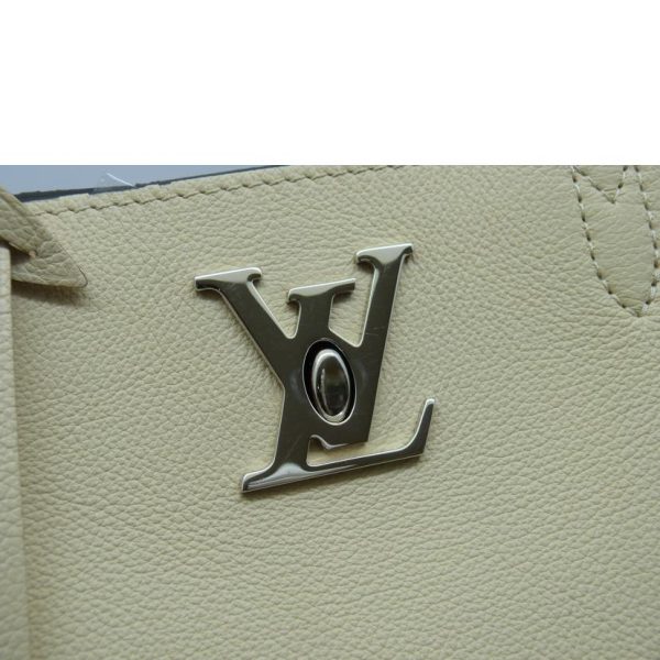 06947 8 Louis Vuitton Lock Me Cover Bag Monogram