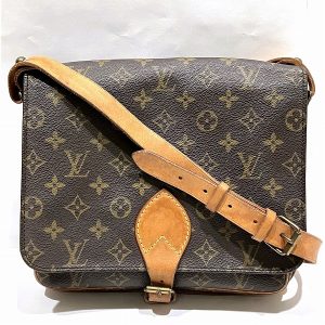 100302050a701846 1 Louis Vuitton Monogram Manhattan PM Handbag Leather Brown