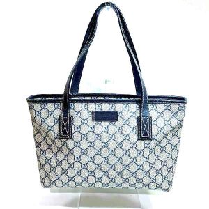 100302050aa01159 1 Louis Vuitton Lock Me Shopper Tote Bag Grain Leather Greige