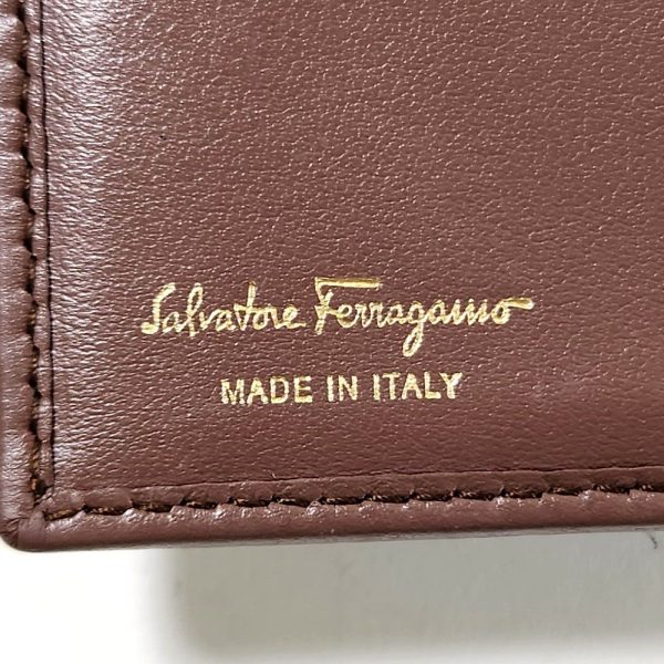 1038 7 Ferragamo Gancini Bifold Wallet Leather Brown