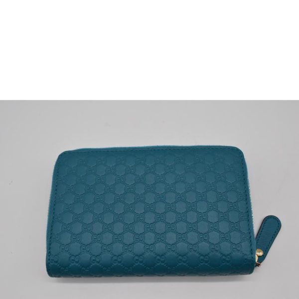 11890 2 Gucci Micro Guccisima Compact Round Zipper Wallet