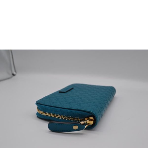 11890 3 Gucci Micro Guccisima Compact Round Zipper Wallet