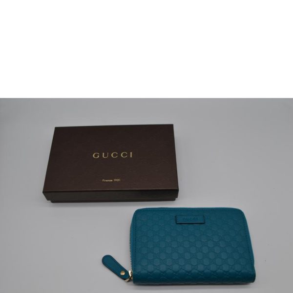 11890 8 Gucci Micro Guccisima Compact Round Zipper Wallet