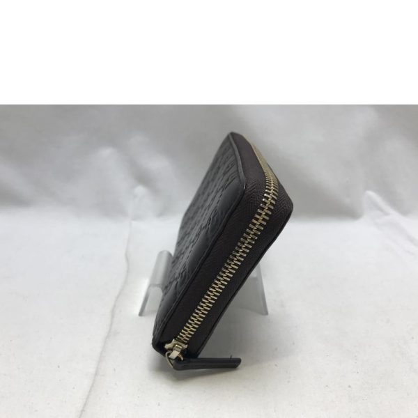 16142 2 Gucci Guccisima Round Zipper Wallet Black