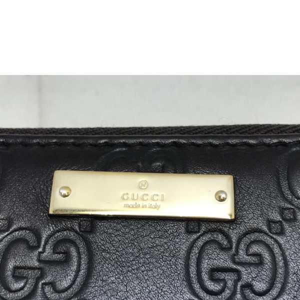 16142 5 Gucci Guccisima Round Zipper Wallet Black