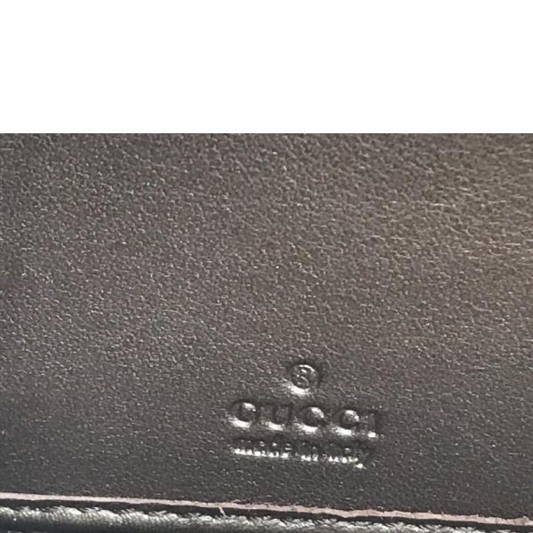 16142 8 Gucci Guccisima Round Zipper Wallet Black