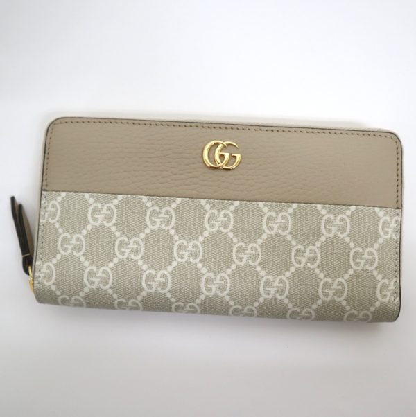 2000090255600017 1 Gucci Double G Zip Around Wallet Oatmeal