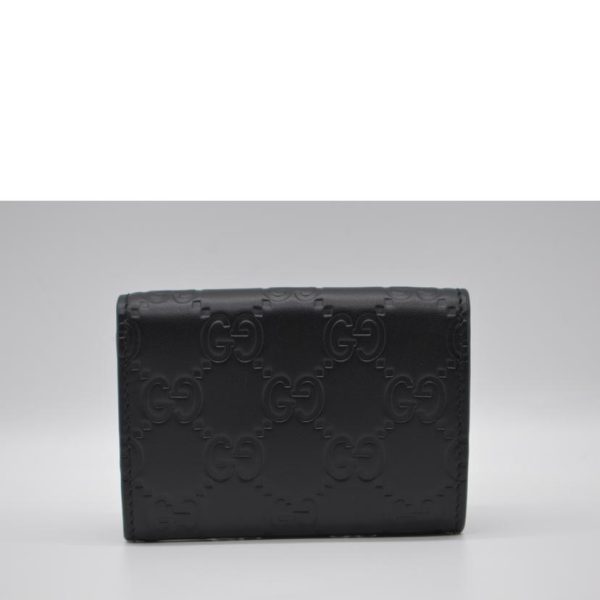 21566 2 Gucci Avel GG Signature Compact Leather Wallet