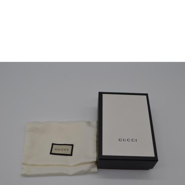 21566 7 Gucci Avel GG Signature Compact Leather Wallet