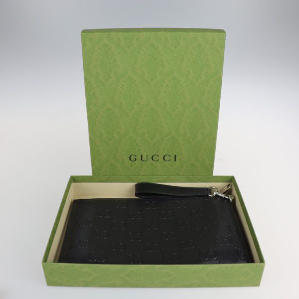 2213073010071 9 GUCCI Clutch Bag GG Embossed Leather Black