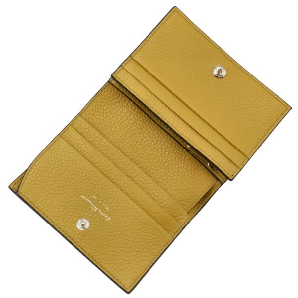 22d51400010501 4 Ferragamo Gancini Bifold Wallet Yellow