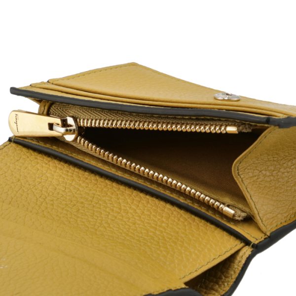 22d51400010501 6 Ferragamo Gancini Bifold Wallet Yellow