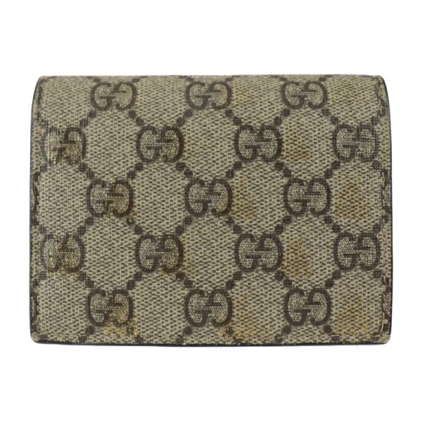 2301113007016 1 Gucci Compact Bifold Wallet GG Supreme Beige Brown