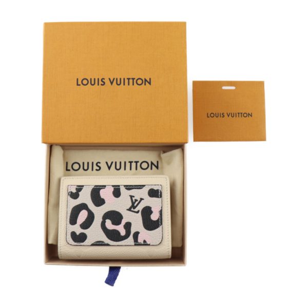 2407033007042 10 Louis Vuitton Claire Wild At Heart Wallet Creme