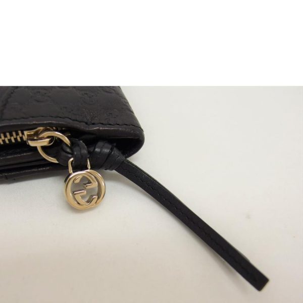 25705 9 Gucci Guccissima Round Zipper Bifold Long Wallet Black