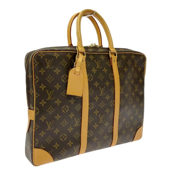 276153 2 LOUIS VUITTON Monogram PVC Porte de Cumin Voyage Brown