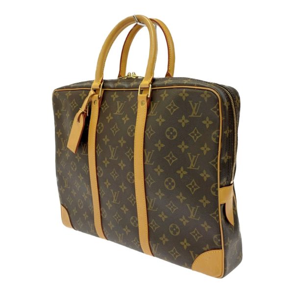 276153 3 LOUIS VUITTON Monogram PVC Porte de Cumin Voyage Brown