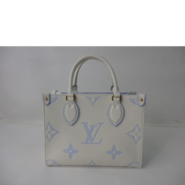 33212 2 Louis Vuitton On the Go PM Bicolor Empreinte Tote Bag Latte White