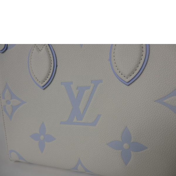 33212 7 Louis Vuitton On the Go PM Bicolor Empreinte Tote Bag Latte White