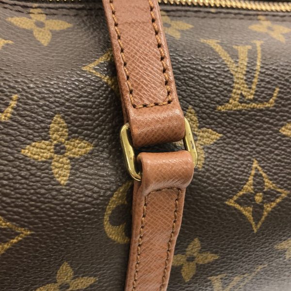 36213415 10 Louis Vuitton Old Papillon Canvas Monogram Handbag Brown