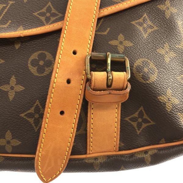 36897405 11 Louis Vuitton Saumur Monogram Canvas Shoulder Bag Brown