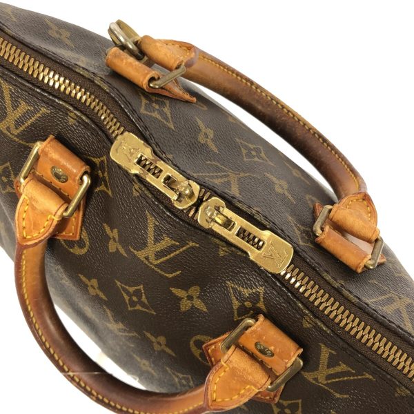 37182439 11 Louis Vuitton Alma Monogram Canvas Handbag Brown