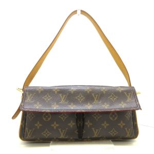 37238234 1 LOUIS VUITTON Pochette Cousin Monogram Black