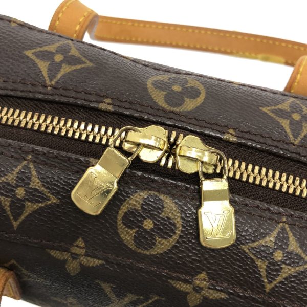 37269653 11 Louis Vuitton Spontini Monogram Canvas Handbag Brown