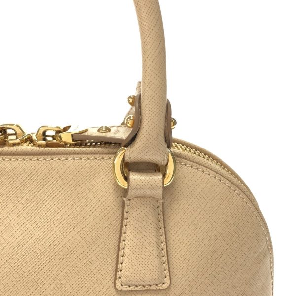 37312400 9 Salvatore Ferragamo Dalina Gancini Leather Handbag Beige