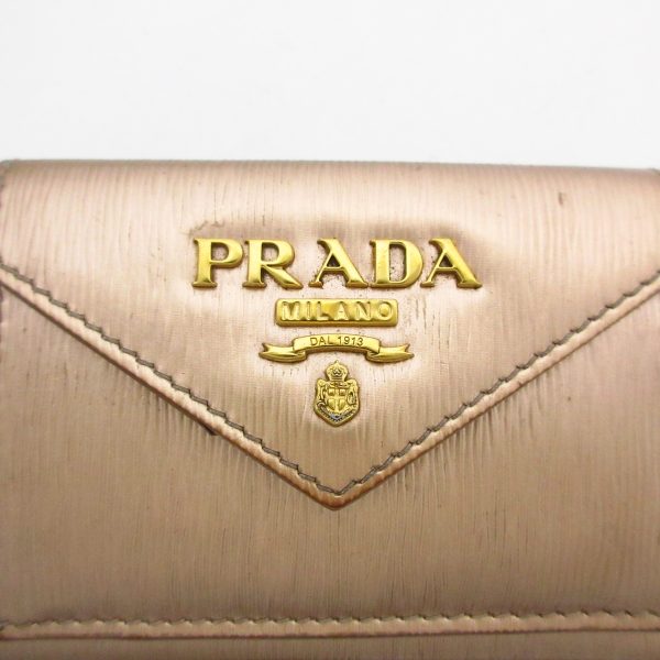 37347457 7 Prada Trifold Wallet Enamel Pink Gold