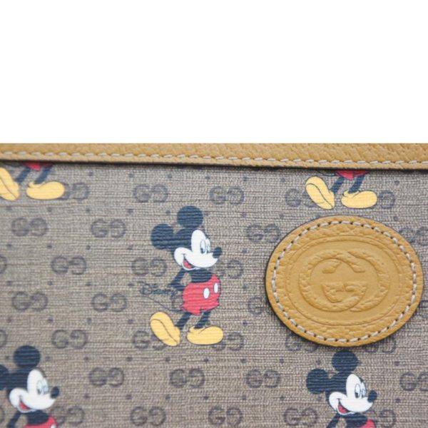 37543 5 Gucci Disney Collaboration Mini GG Supreme Clutch Bag