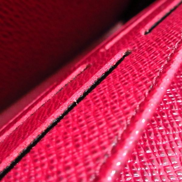 37565217 7 Louis Vuitton Portefeuille Sara Canvas Monogram Long Wallet Fuchsia