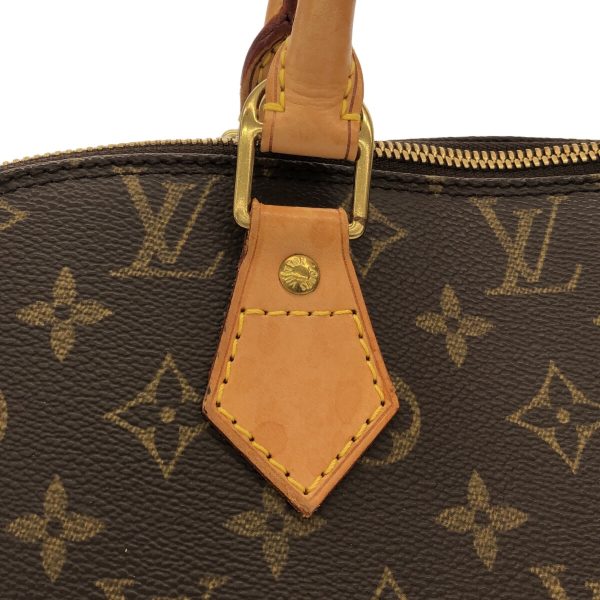 37594737 10 Louis Vuitton Alma Monogram Canvas Handbag Brown