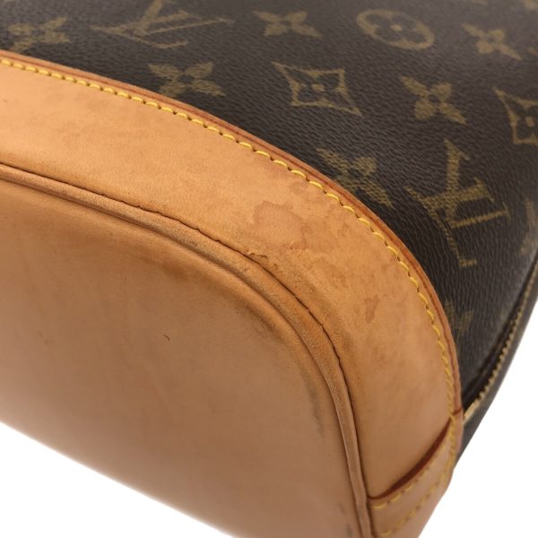 37594737 5 Louis Vuitton Alma Monogram Canvas Handbag Brown