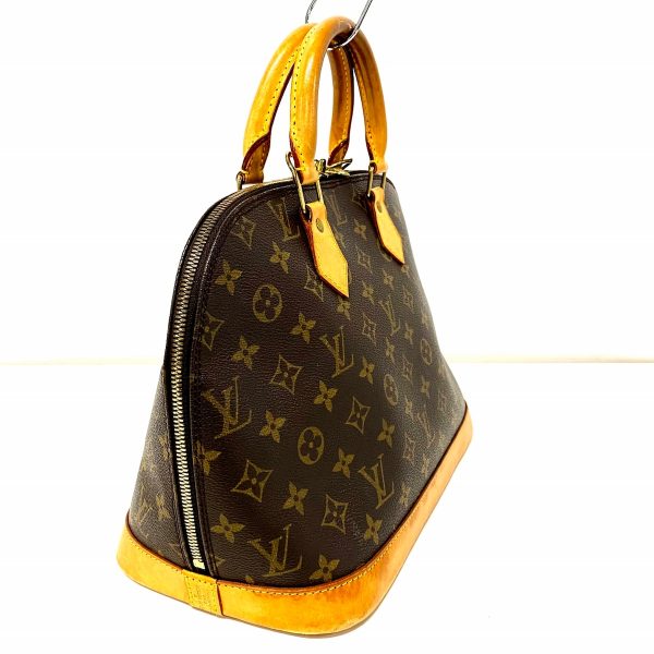 37598685 2 Louis Vuitton Alma Monogram Canvas Handbag Brown