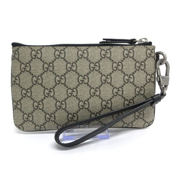 37603505 2 Gucci Snake Print GG Supreme Wristlet Beige