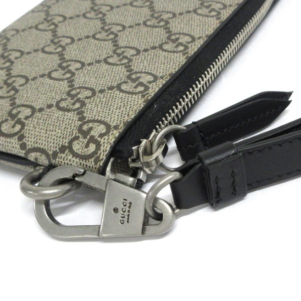 37603505 7 Gucci Snake Print GG Supreme Wristlet Beige