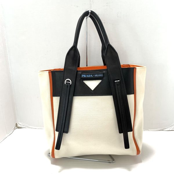 37604838 1 Prada Ouverture Handbag Canvas Leather White