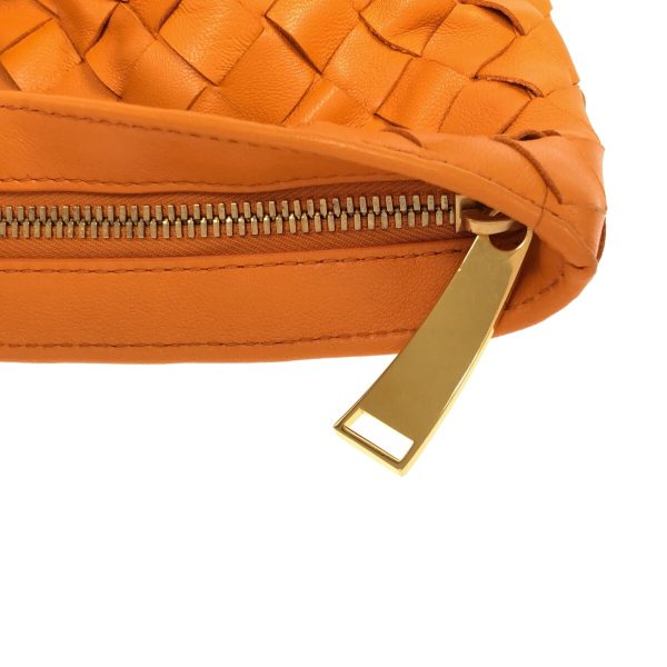 37607094 10 Bottega Veneta The Twist Maxi Intrecciato Handbag Orange Leather