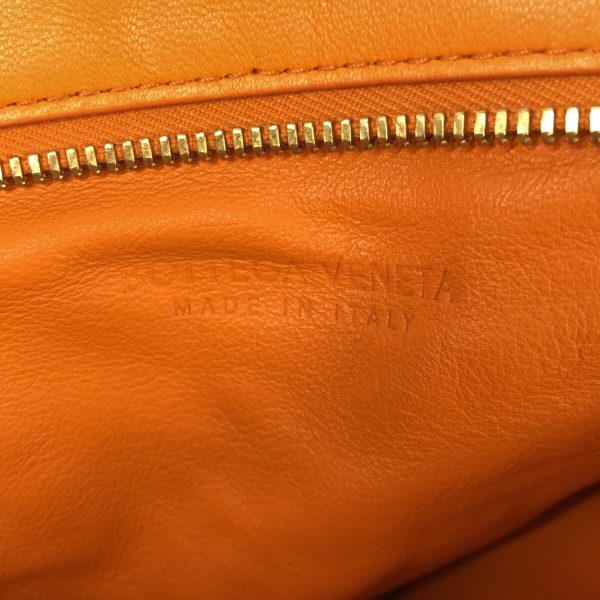 37607094 7 Bottega Veneta The Twist Maxi Intrecciato Handbag Orange Leather