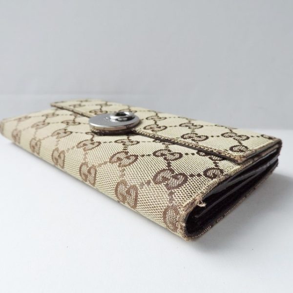 37780582 7 Gucci Eclipse Gg Pattern Jacquard Wallet Beige