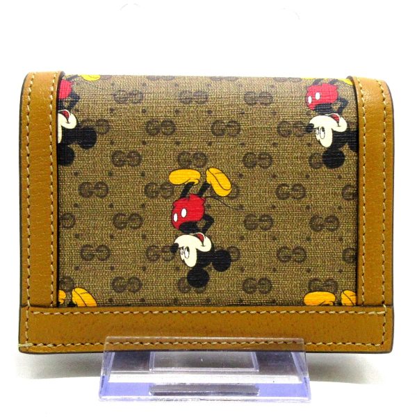 37794261 2 Gucci Gg Supreme Bifold Wallet Brown