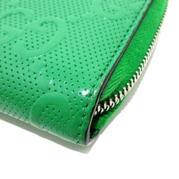 37864794 7 Gucci Gg Embossed Leather Wallet Green