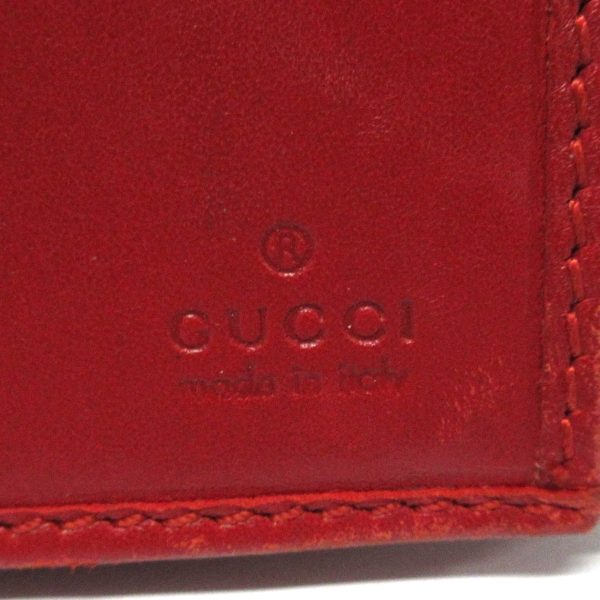 37867735 5 Gucci Gg Pattern Enamel Wallet Red