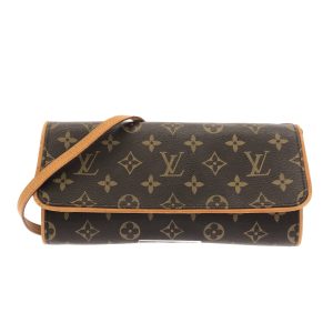 37872495 1 Louis Vuitton Belair Taiga Clutch Bag Brown