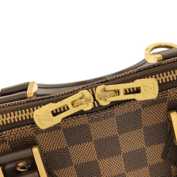 37874469 11 Louis Vuitton Alma Damier Ebene Canvas Handbag Brown