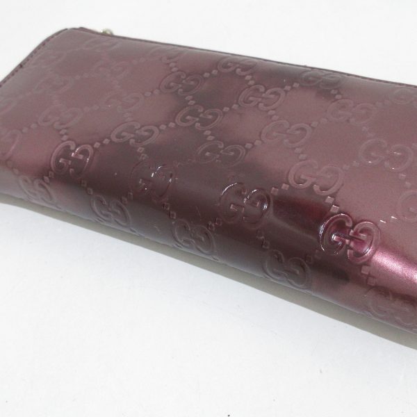 37883703 9 Gucci Lovely Shimaline Enamel Wallet Bordeaux